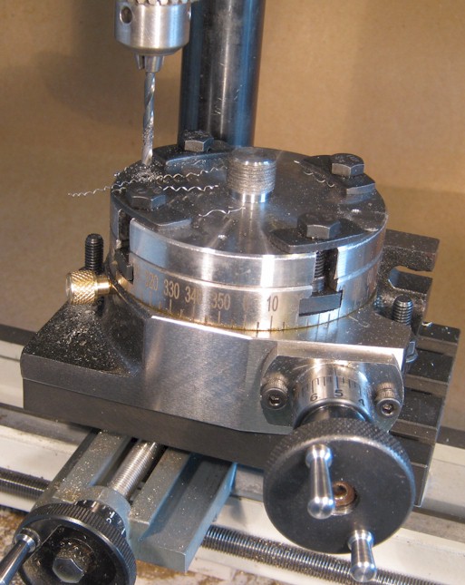 Drilling the rotary table to locate the Unimat adaptor
