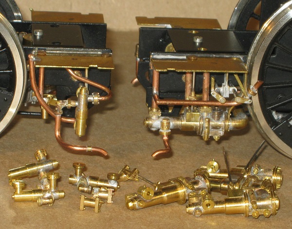 A collection of exhaust and live steam injectors in 7mm scale (0 gauge), fabricated by David L O Smith