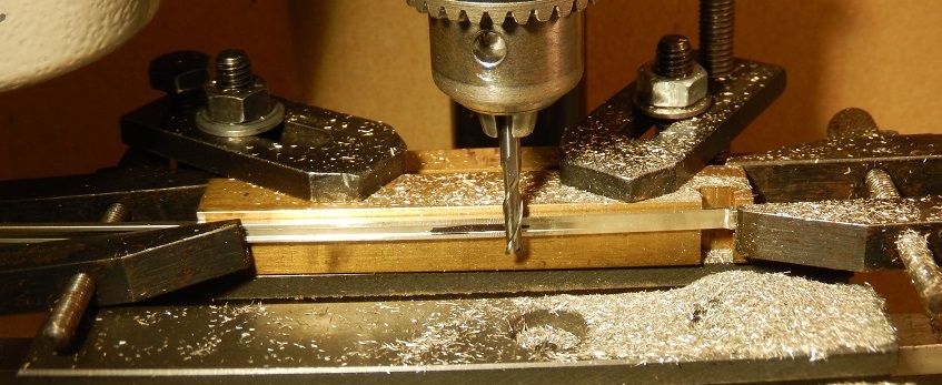 Side milling of a switch rail